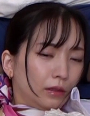 Source image for Woman Lying Down Eyes Closed Expressive Face Transitioning to Motion