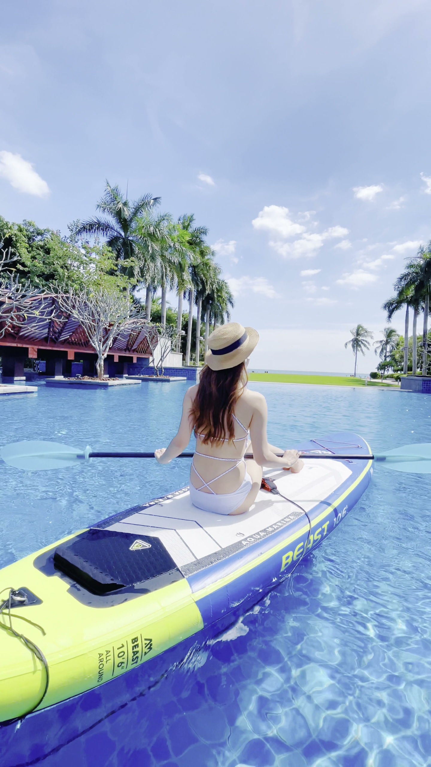 Source image for Tropical Pool Paddleboarder Magazine Cover Freeze Frame Intro