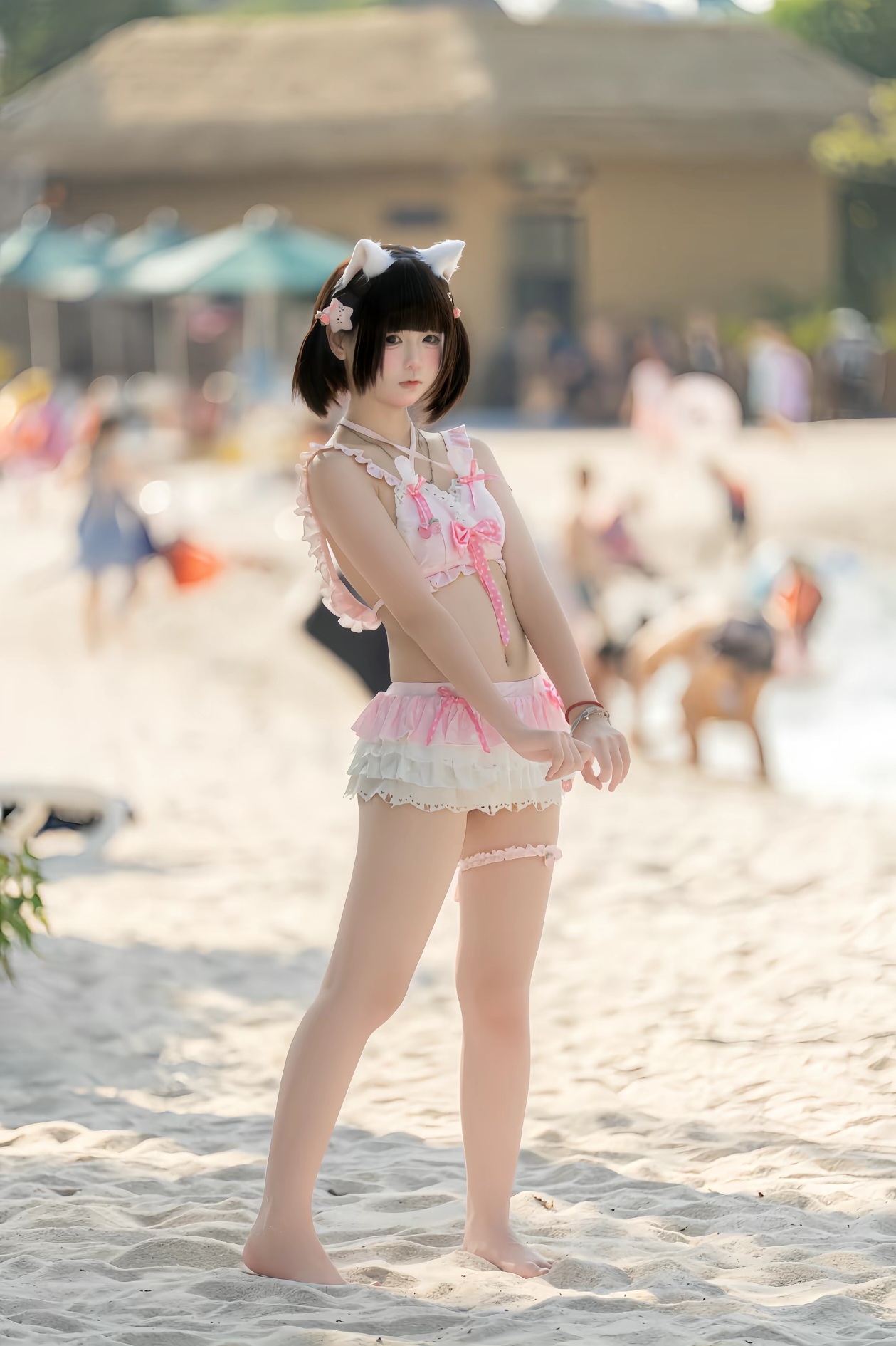 Source image for Cat-Ear Cosplayer Stumbles Playfully on Sunny Beach Sand