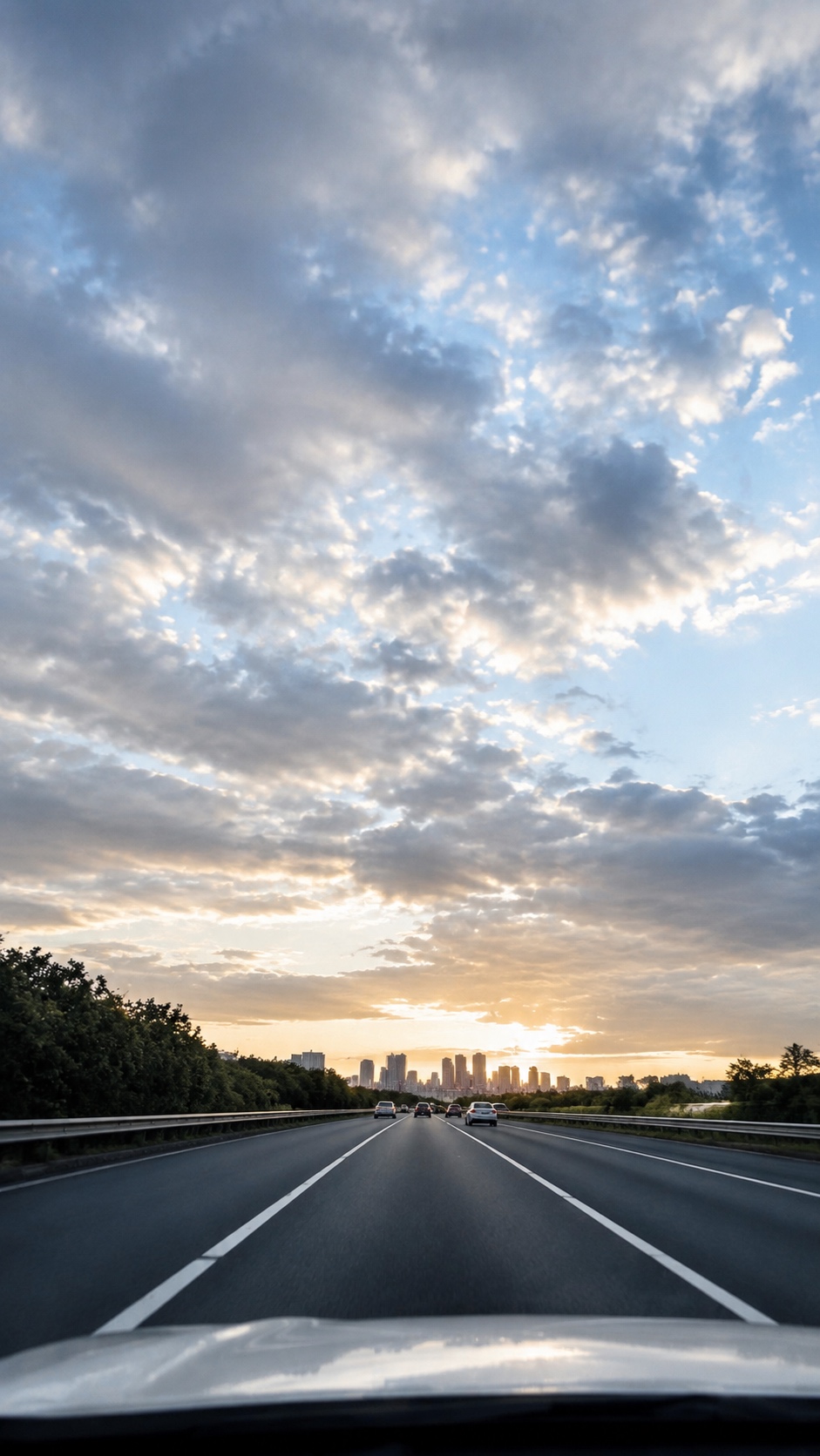 Source image for Highway Speed Rush Towards City Sunset Skyline