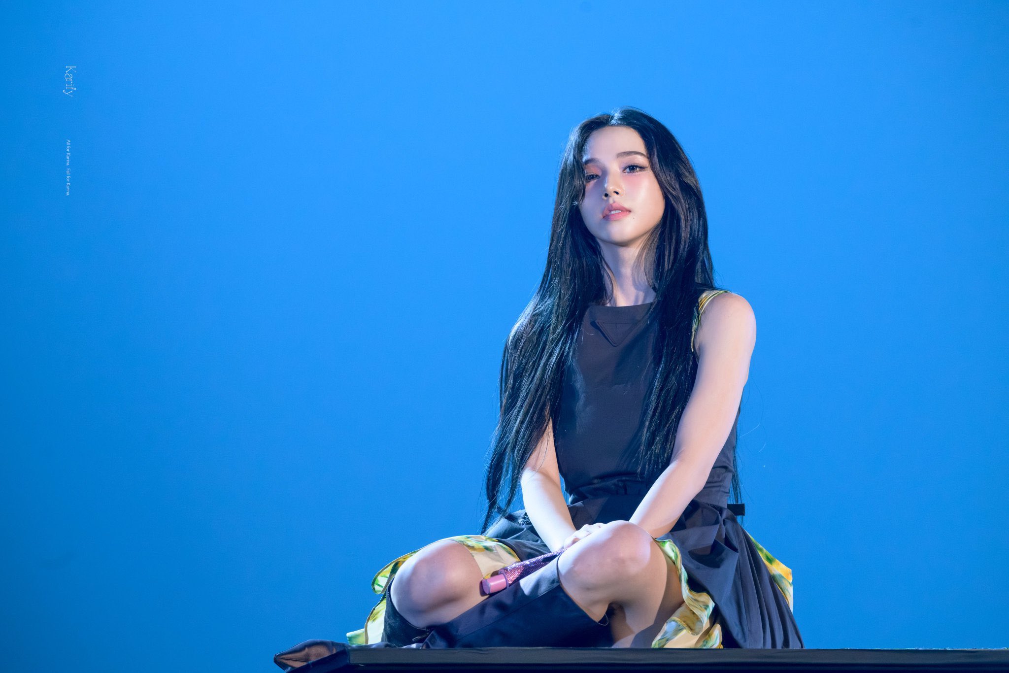 Source image for Singer Breaks Intense Stare with Sudden Comedic Blink on Blue Stage