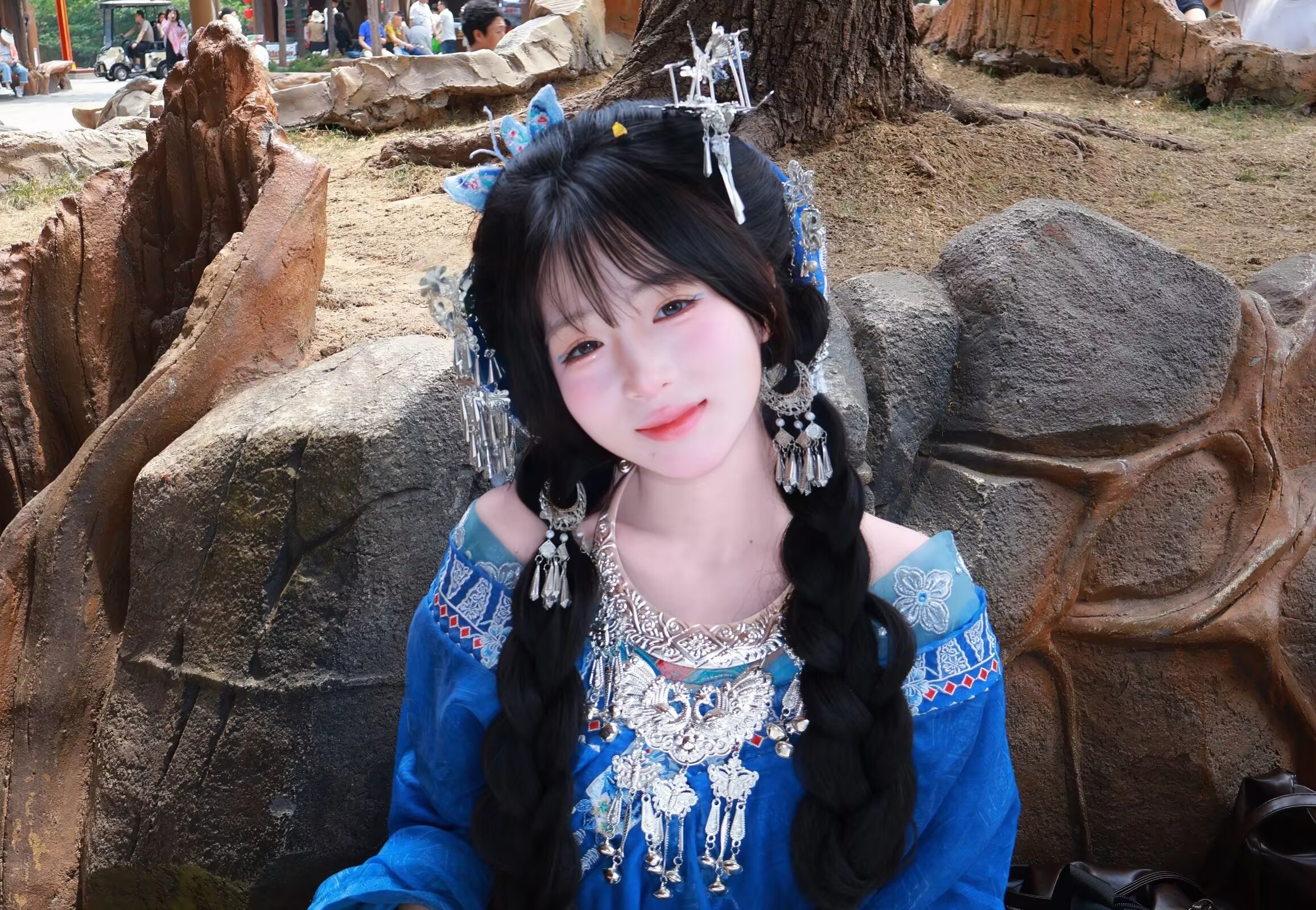 Source image for Blue Costumed Girl Silver Headdress Jingles and Braid Shake