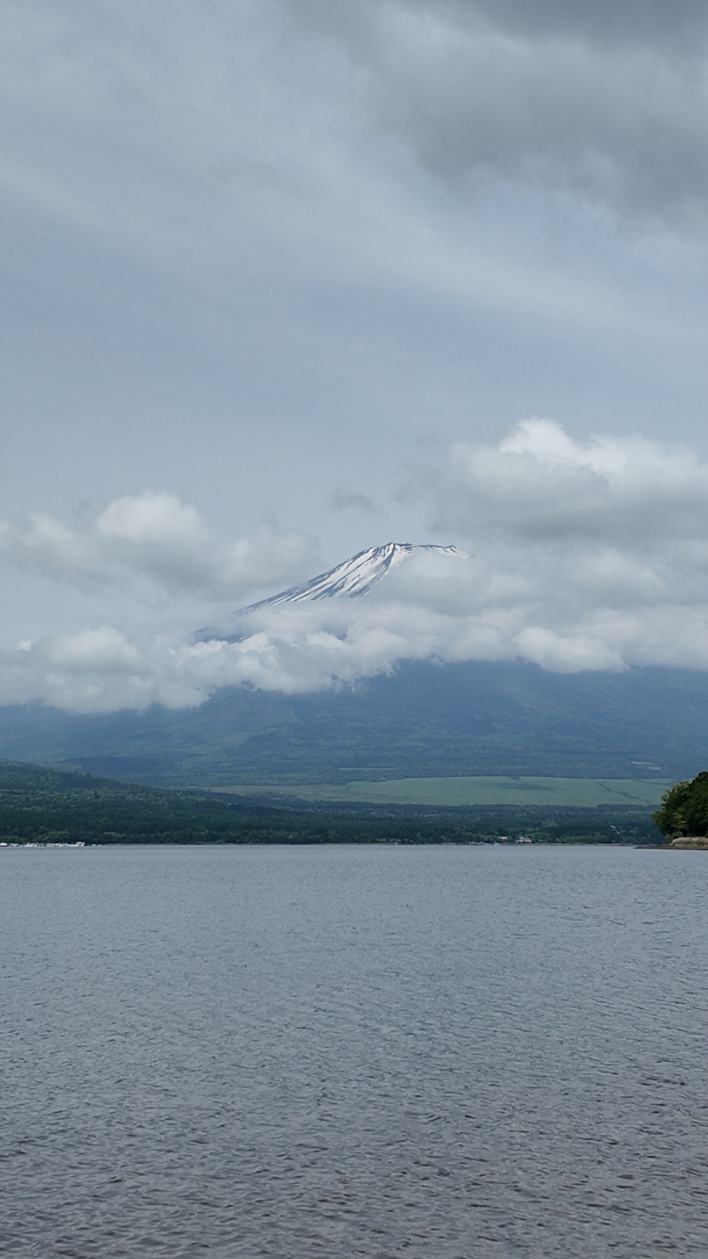 Source image for Drone Forward Motion Over Lake With Drifting Clouds And Snowy Peak