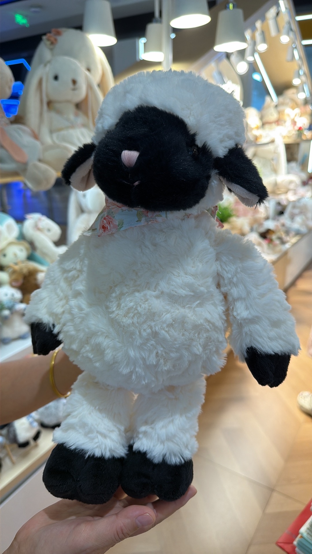 Source image for Floral Scarf Sheep Toy Gets Sudden Dance Move in Store