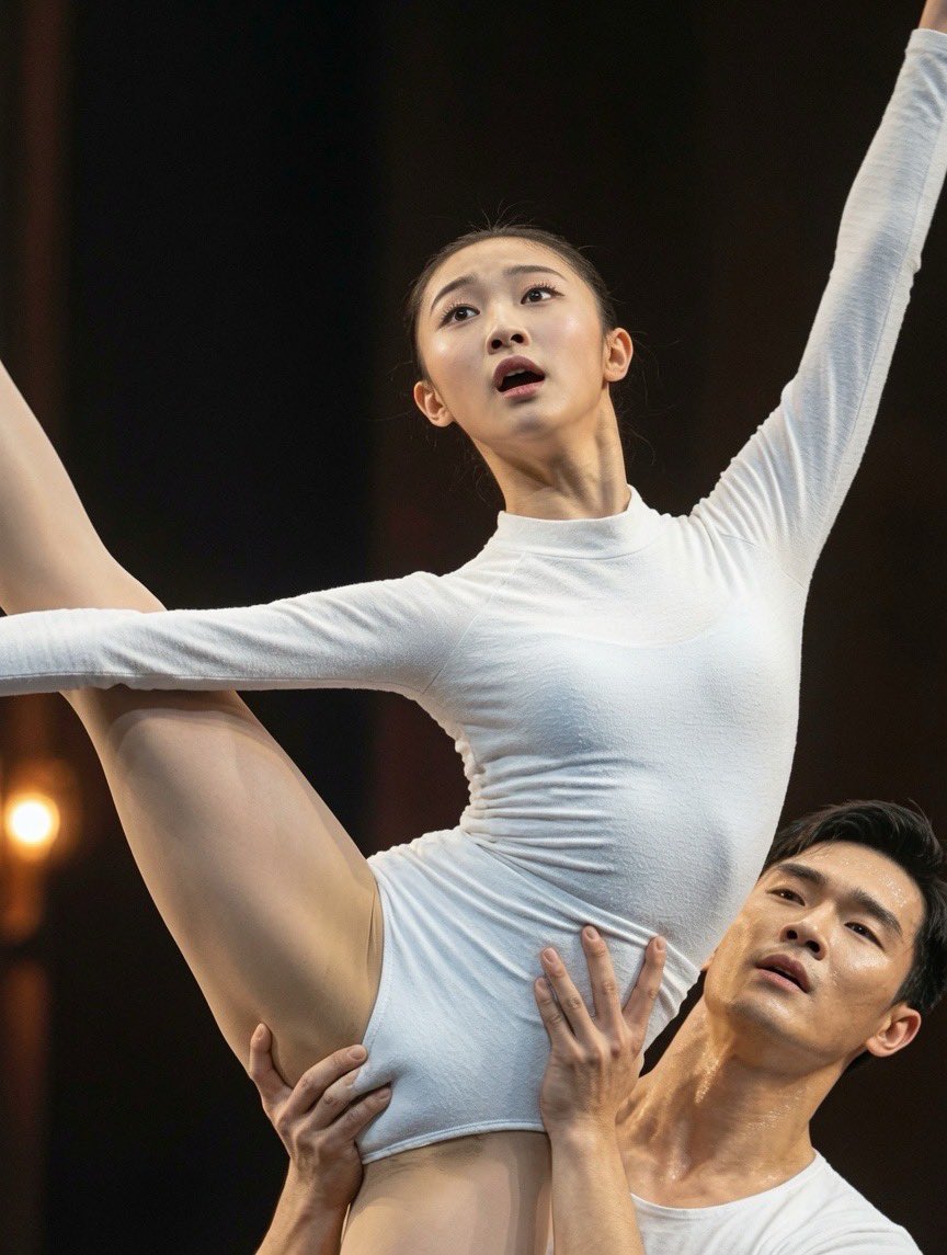Source image for Ballet Dancer Holds Extreme Lift Pose on Stage