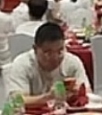 Source image for Man at Banquet Table Reacting to Meal with Intense Focus