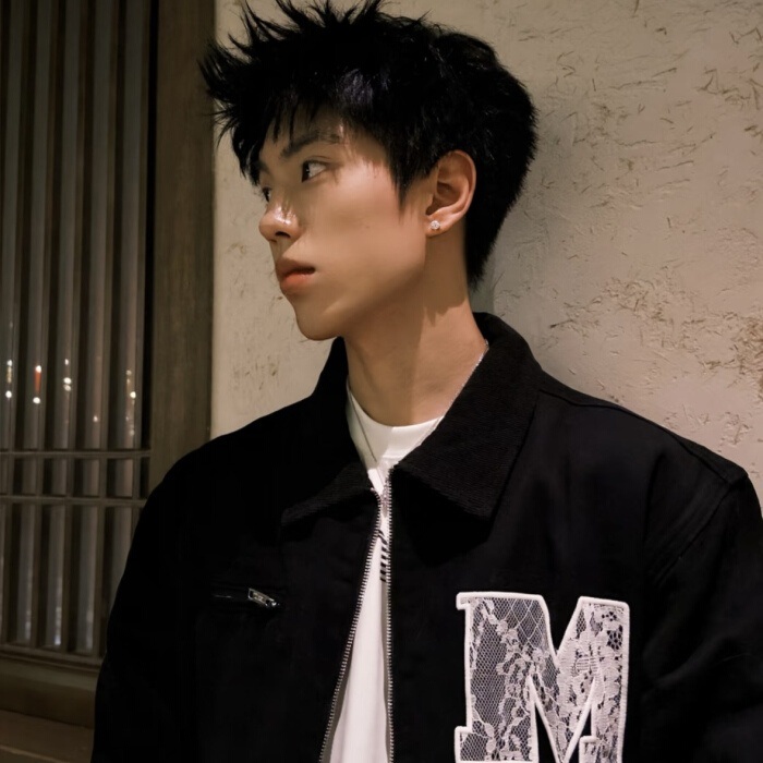 Source image for Stoic Model in Black Jacket Reacts to Off-Screen Distraction